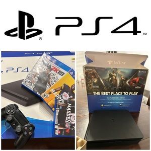 Sony PS4 1TB gaming system with 3 games.